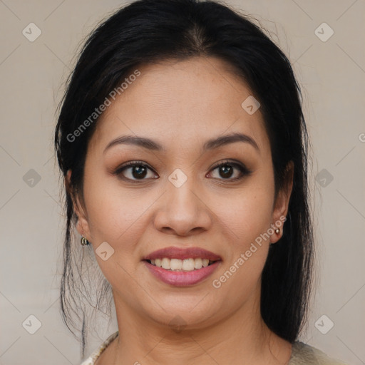 Joyful latino young-adult female with medium  brown hair and brown eyes