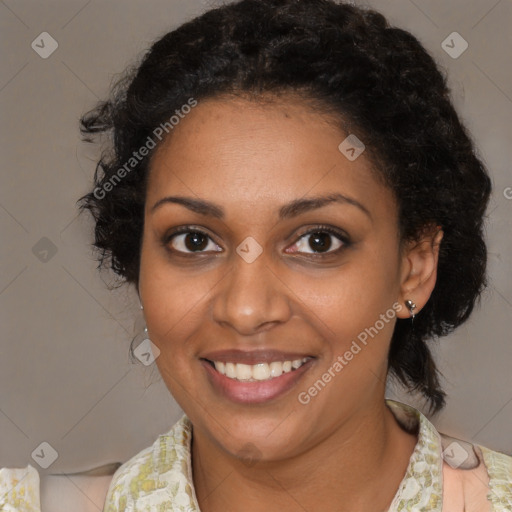 Joyful black young-adult female with medium  black hair and brown eyes