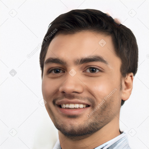 Joyful white young-adult male with short  black hair and brown eyes