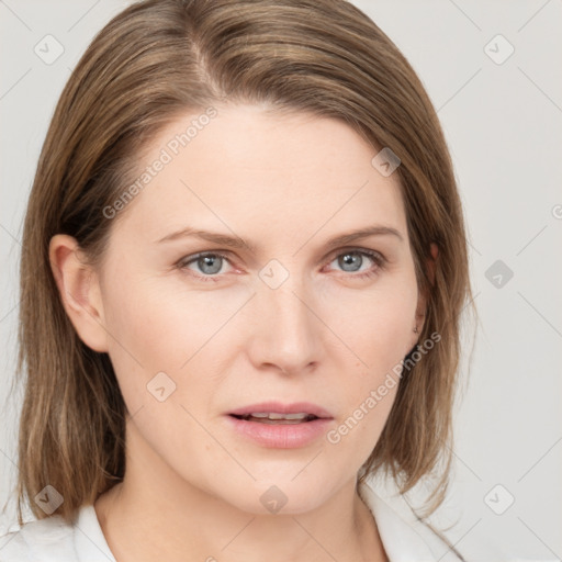 Neutral white young-adult female with medium  brown hair and grey eyes