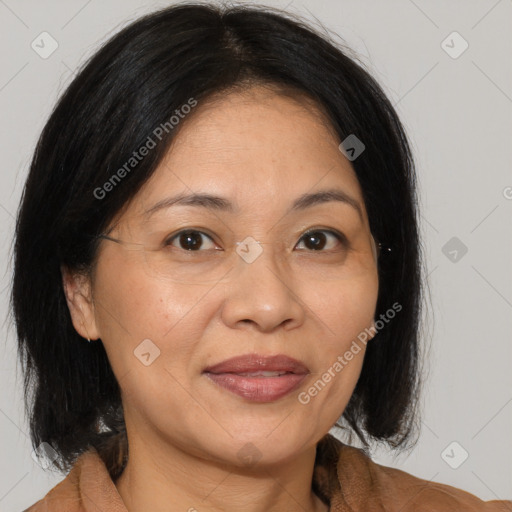 Joyful white adult female with medium  brown hair and brown eyes