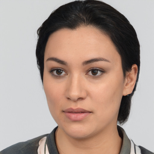 Joyful white young-adult female with medium  black hair and brown eyes