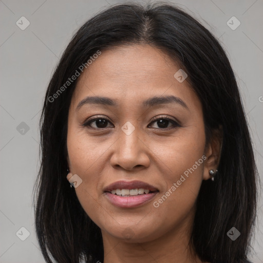 Joyful asian young-adult female with long  brown hair and brown eyes