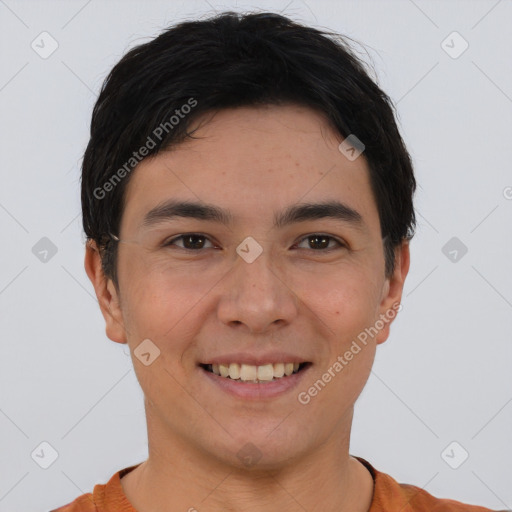 Joyful asian young-adult male with short  brown hair and brown eyes