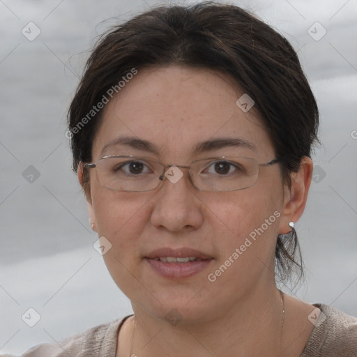 Joyful white adult female with short  brown hair and brown eyes