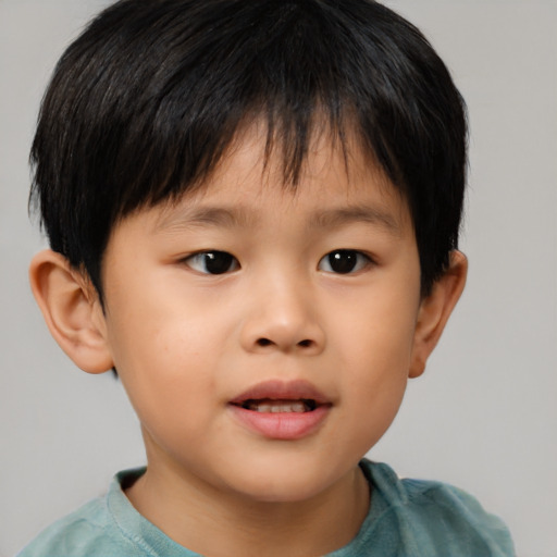 Neutral asian child male with short  brown hair and brown eyes