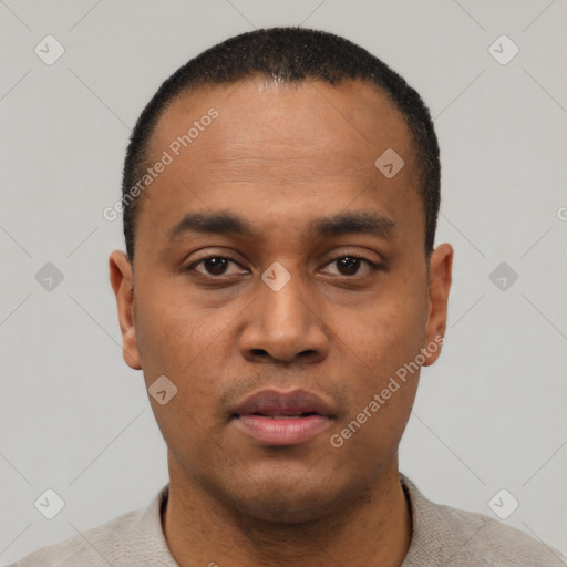 Neutral black young-adult male with short  black hair and brown eyes
