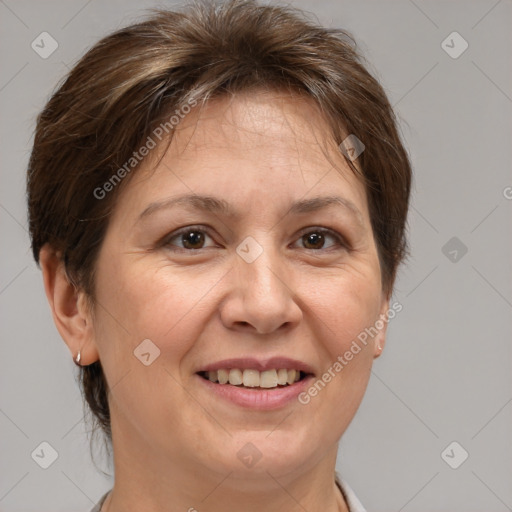 Joyful white adult female with short  brown hair and brown eyes