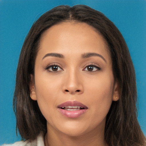 Joyful white young-adult female with long  brown hair and brown eyes