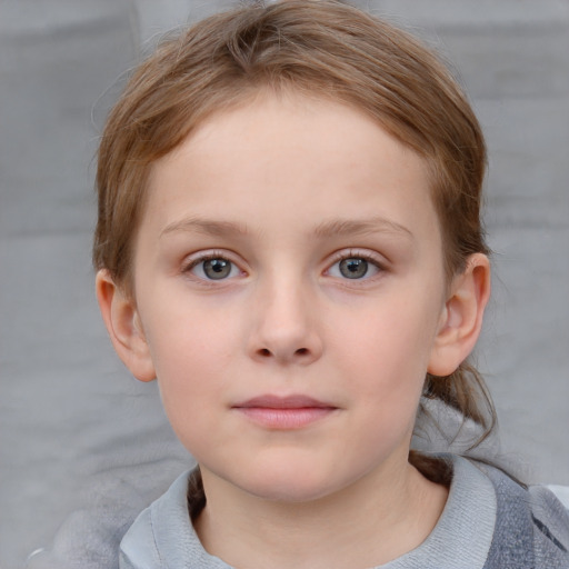 Neutral white child female with short  brown hair and blue eyes