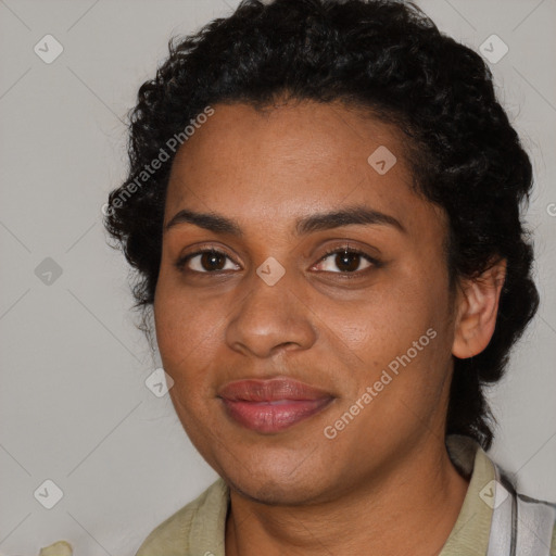 Joyful black young-adult female with medium  black hair and brown eyes