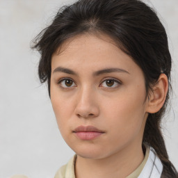 Neutral asian young-adult female with medium  brown hair and brown eyes