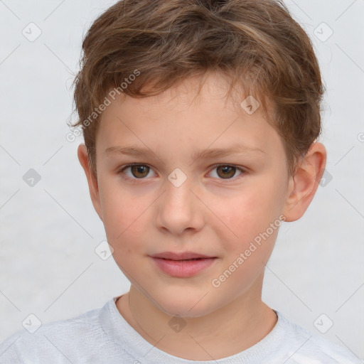 Joyful white child male with short  brown hair and brown eyes