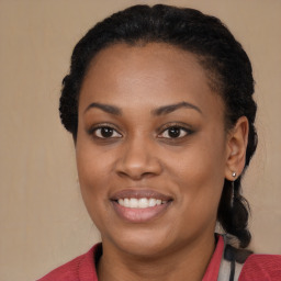 Joyful black young-adult female with medium  brown hair and brown eyes