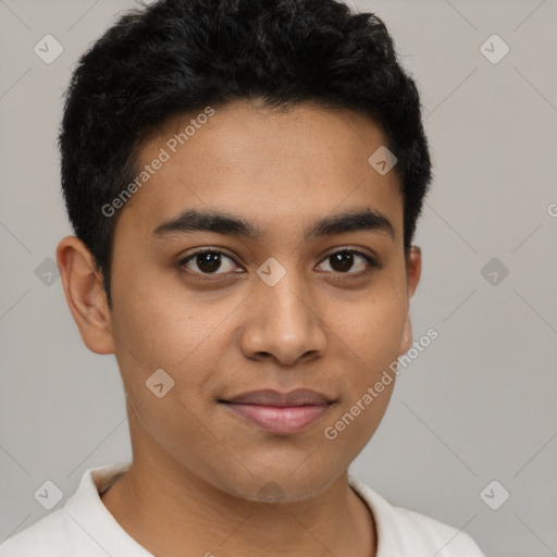 Joyful latino young-adult male with short  brown hair and brown eyes