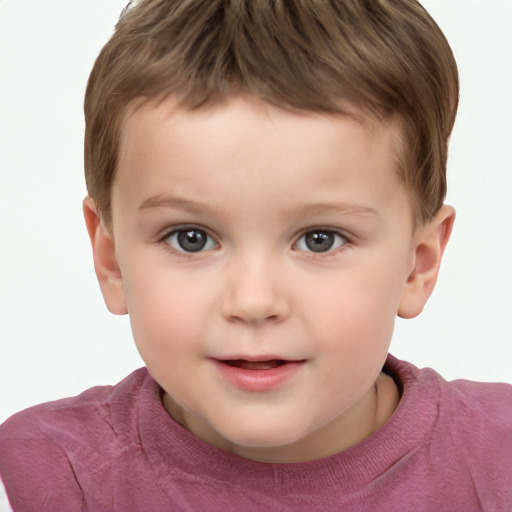 Joyful white child male with short  brown hair and brown eyes