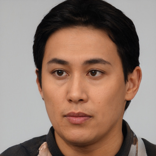 Neutral asian young-adult male with short  black hair and brown eyes