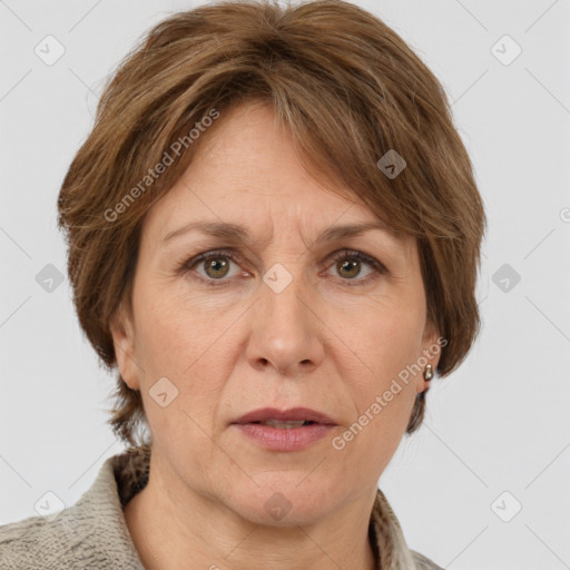 Joyful white adult female with medium  brown hair and grey eyes