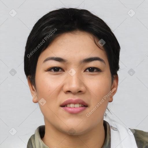 Joyful asian young-adult female with short  black hair and brown eyes