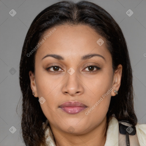 Joyful latino young-adult female with medium  brown hair and brown eyes