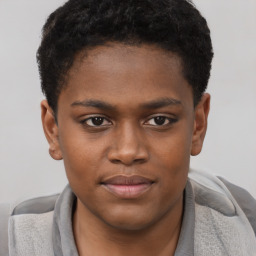 Joyful black young-adult male with short  brown hair and brown eyes