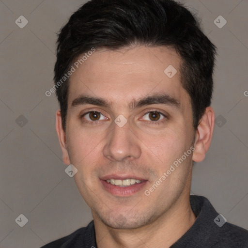 Joyful white young-adult male with short  black hair and brown eyes