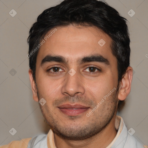 Joyful white young-adult male with short  black hair and brown eyes