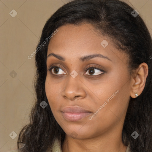 Neutral black young-adult female with long  brown hair and brown eyes