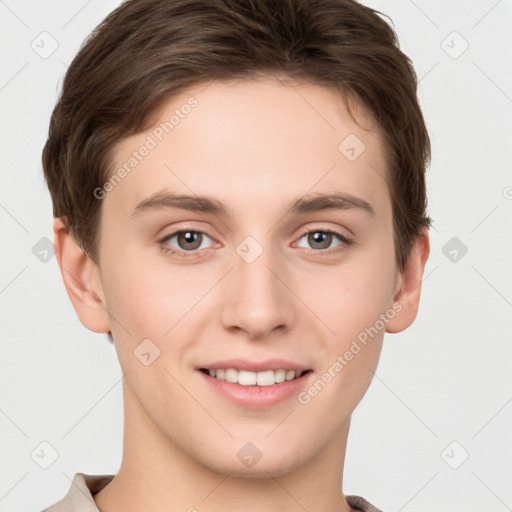 Joyful white young-adult female with short  brown hair and grey eyes