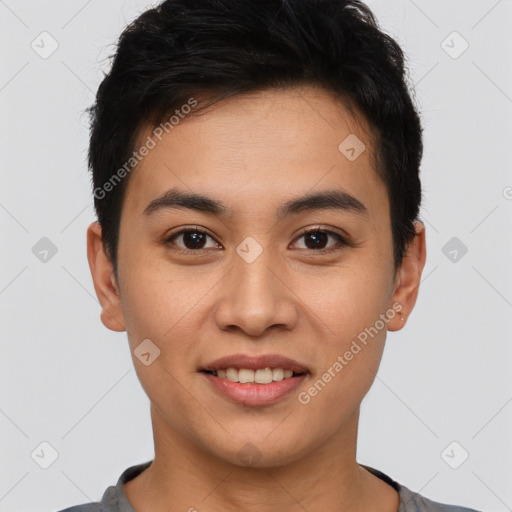 Joyful asian young-adult male with short  brown hair and brown eyes