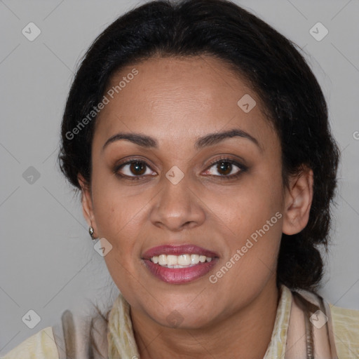 Joyful latino adult female with medium  brown hair and brown eyes