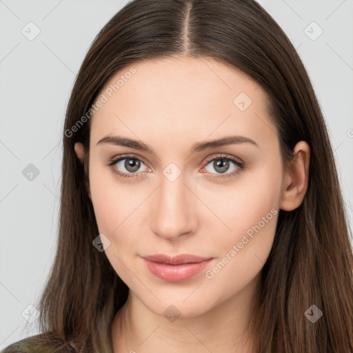 Neutral white young-adult female with long  brown hair and brown eyes