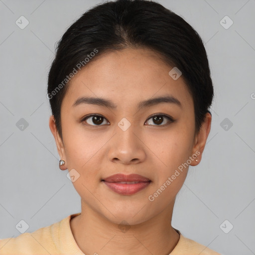 Joyful asian young-adult female with short  brown hair and brown eyes