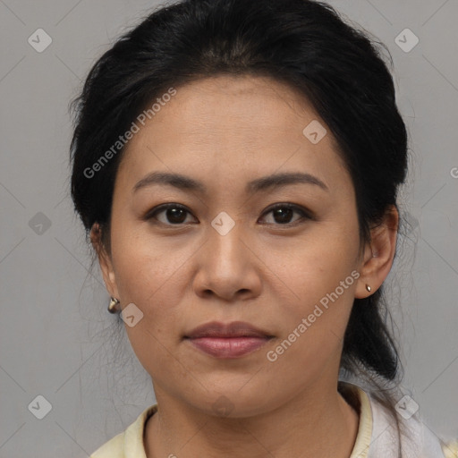 Joyful asian young-adult female with medium  brown hair and brown eyes