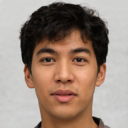 Neutral asian young-adult male with short  brown hair and brown eyes