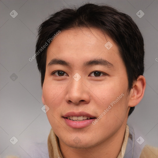 Joyful asian young-adult male with short  brown hair and brown eyes