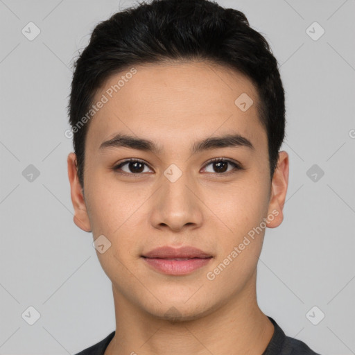 Joyful asian young-adult male with short  black hair and brown eyes