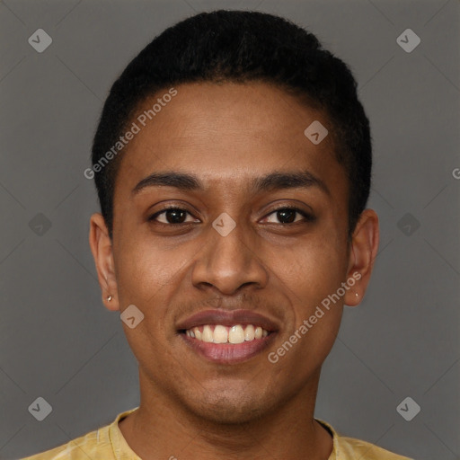 Joyful black young-adult male with short  brown hair and brown eyes