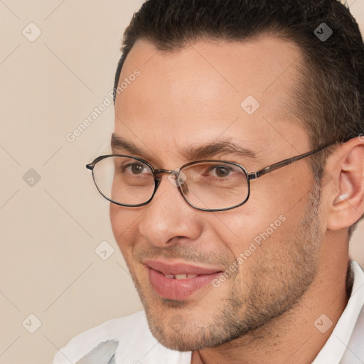 Joyful white adult male with short  brown hair and brown eyes