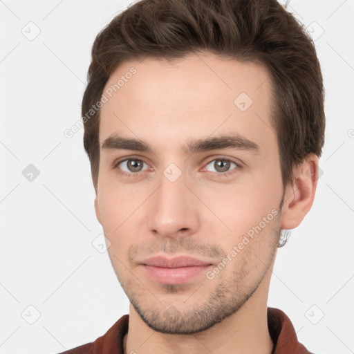 Neutral white young-adult male with short  brown hair and brown eyes