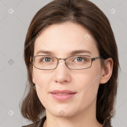 Joyful white young-adult female with medium  brown hair and blue eyes