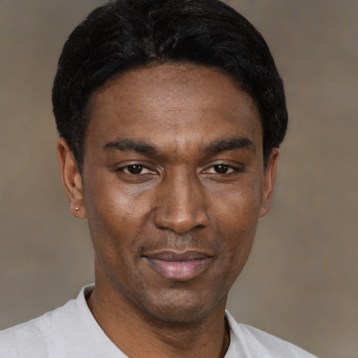 Neutral black young-adult male with short  black hair and brown eyes