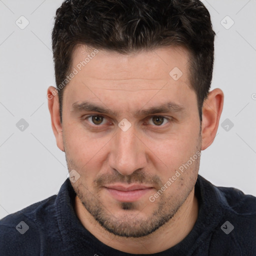 Joyful white adult male with short  brown hair and brown eyes