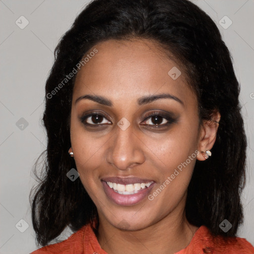 Joyful black young-adult female with medium  brown hair and brown eyes