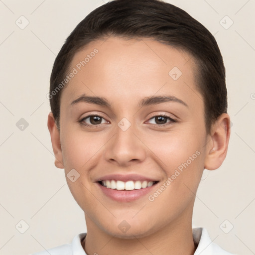 Joyful white young-adult female with short  brown hair and brown eyes