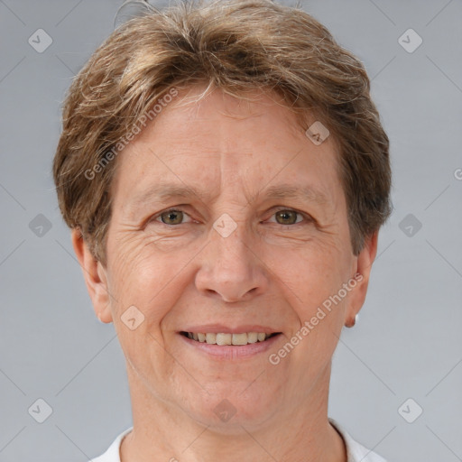 Joyful white adult female with short  brown hair and brown eyes