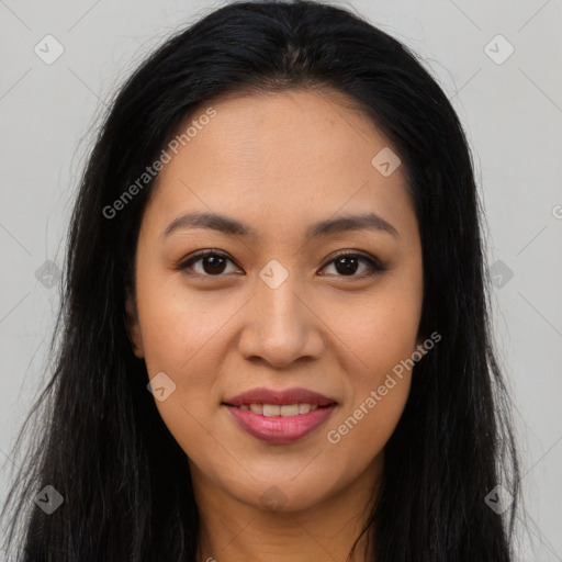 Joyful latino young-adult female with long  brown hair and brown eyes