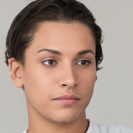 Neutral white young-adult female with short  brown hair and brown eyes