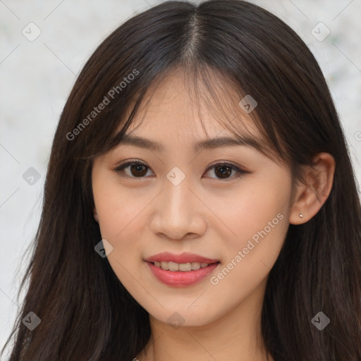 Joyful asian young-adult female with long  brown hair and brown eyes