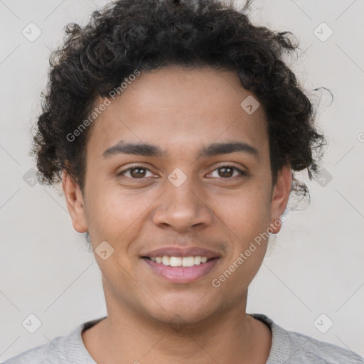 Joyful latino young-adult male with short  brown hair and brown eyes